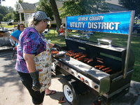 Burgers are done , on go the Dogs..will be served with all the fixings....